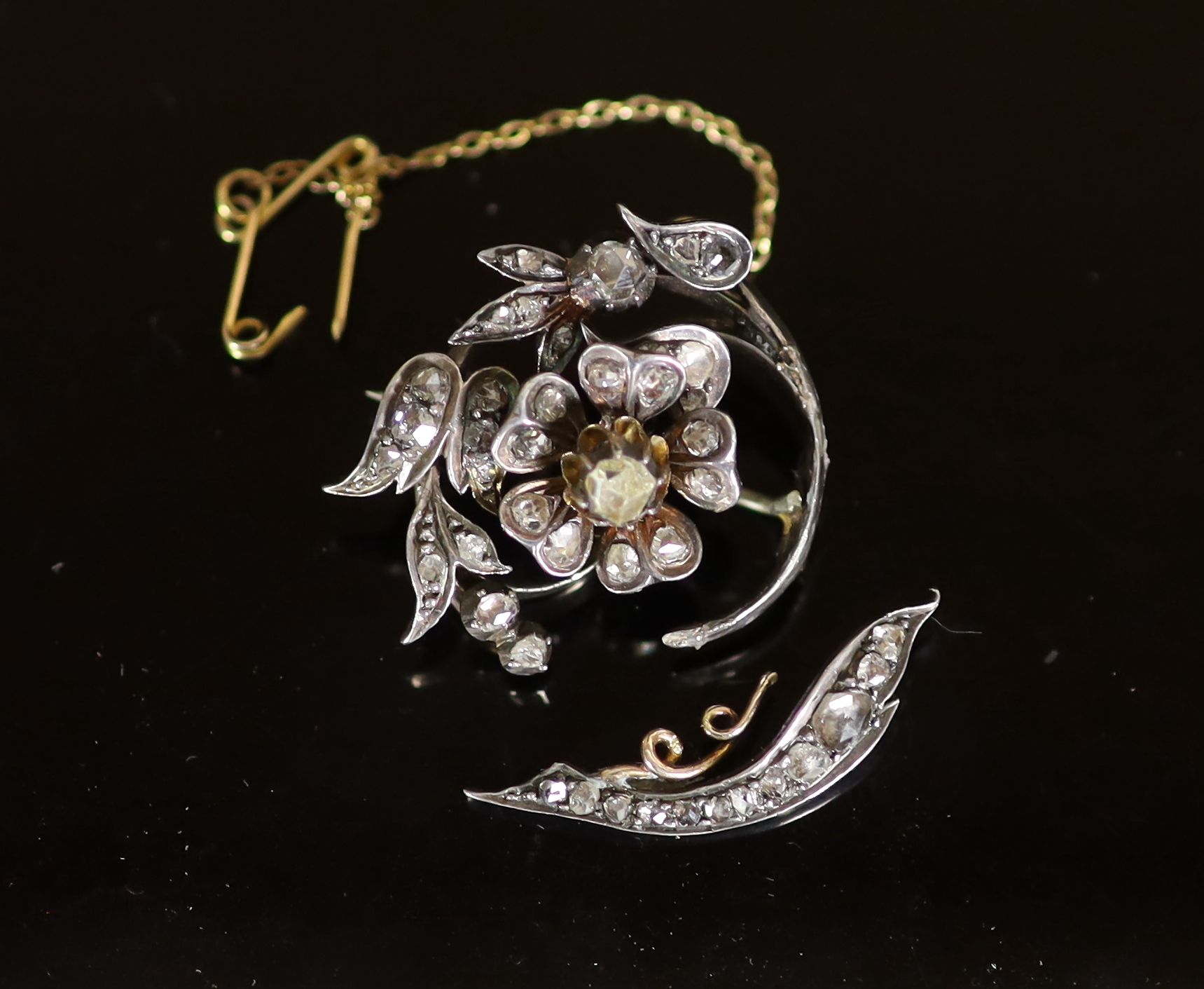 A 19th century gold, silver and rose cut diamond set foliate scroll brooch (a.f.)